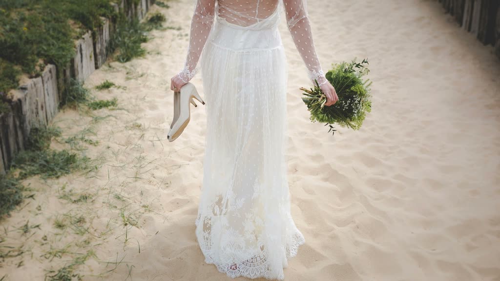Bride on a sandy path